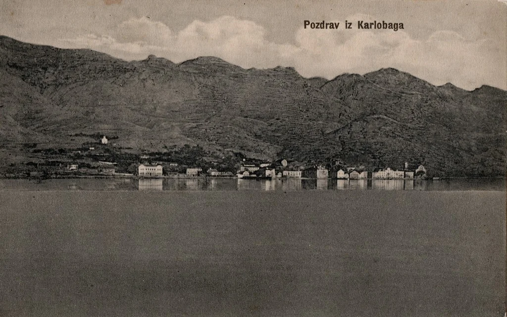Old postcard showing Velebit mountains and a panoramic view of Karlobag, circa 1910