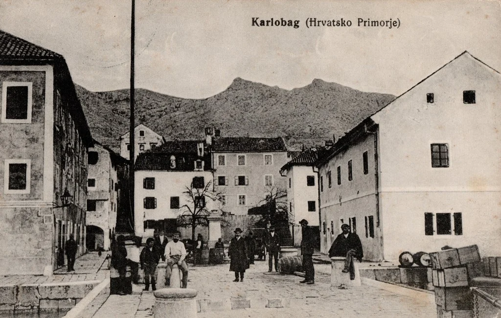 Old square, Molinari statue, customs house, and town hall in Karlobag, 1917